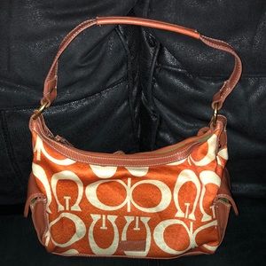 OMEGA LEATHER ORANGE/CREAM CANVAS HANDBAG